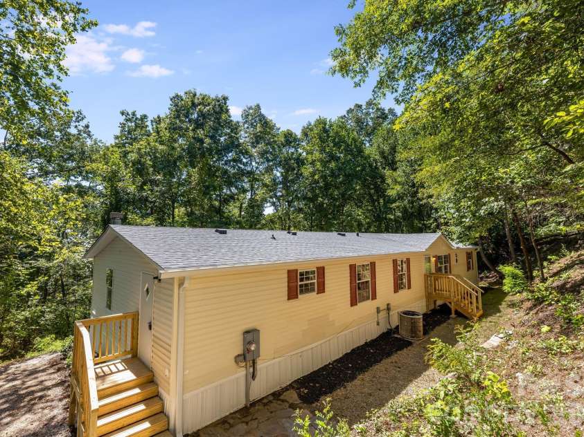 81 Spring Mountain Road, Fairview, NC 28730.  MLS# CAR4418675, YatesRealty ID 47167. 