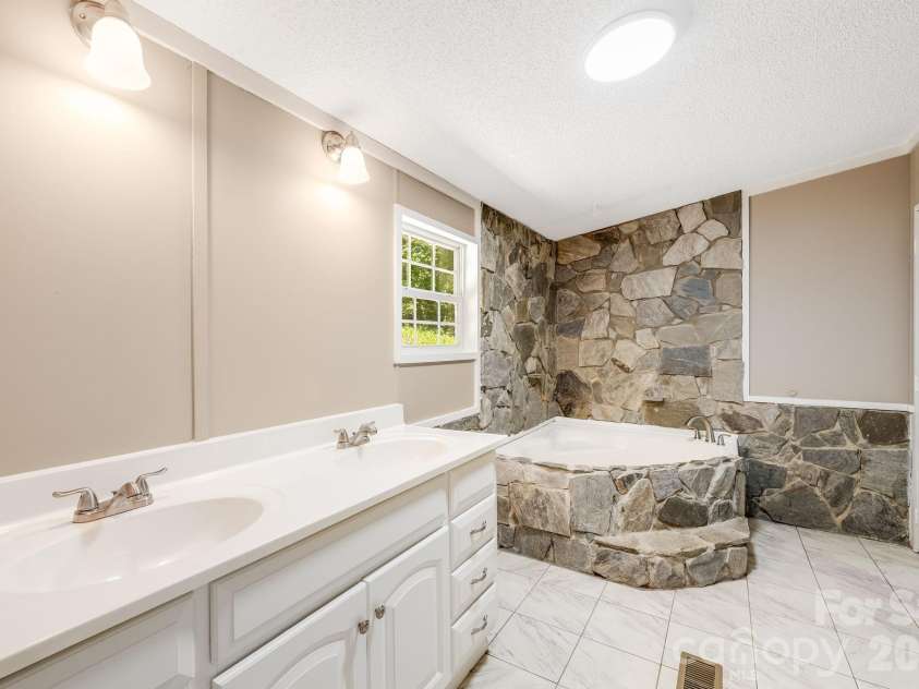 81 Spring Mountain Road, Fairview, NC 28730.  MLS# CAR4418675, YatesRealty ID 47167. 