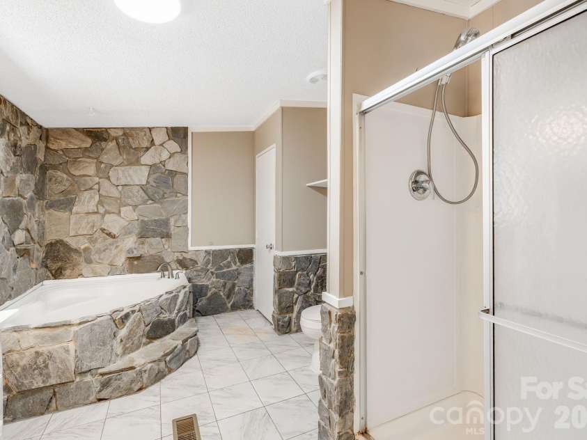 81 Spring Mountain Road, Fairview, NC 28730.  MLS# CAR4418675, YatesRealty ID 47167. 