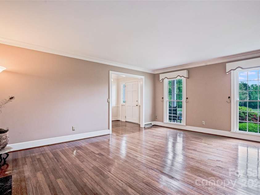 218 Fairway Drive, Shelby, NC 28150.  MLS# CAR4129420, YatesRealty ID 4717. Floor to ceiling windows flood the home with natural light.