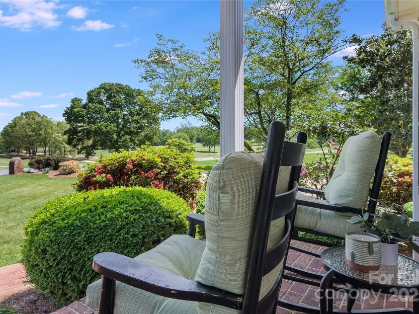 218 Fairway Drive, Shelby, NC 28150.  MLS# CAR4129420, YatesRealty ID 4717. Relax on the front porch and watch the golfers tee off and sink their putts.