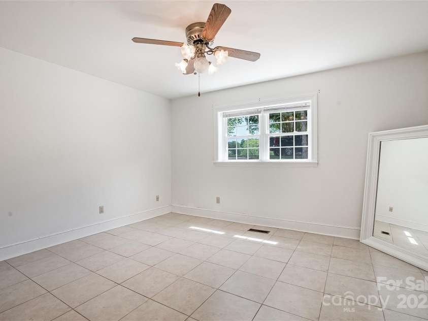 218 Fairway Drive, Shelby, NC 28150.  MLS# CAR4129420, YatesRealty ID 4717. Two large bedrooms on the lower level with ample closet space.