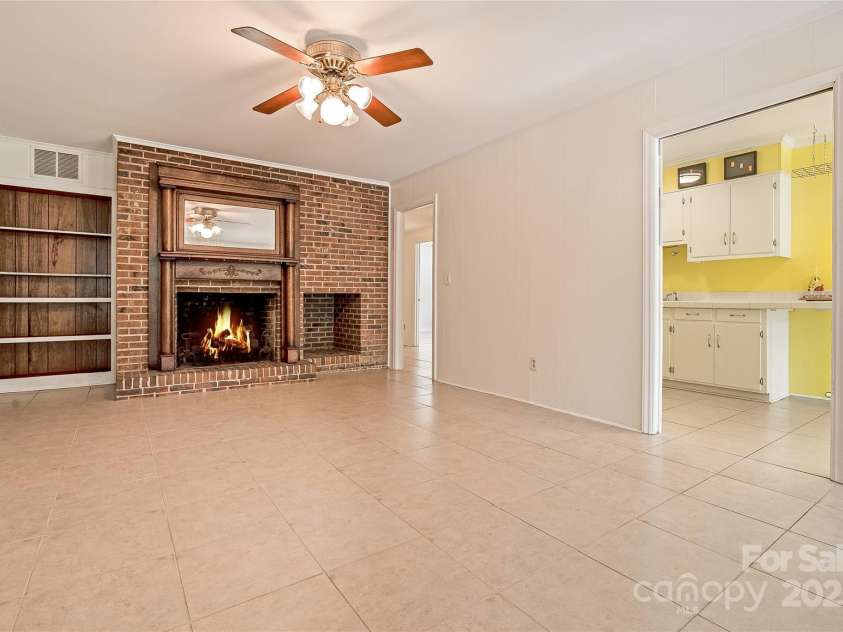 218 Fairway Drive, Shelby, NC 28150.  MLS# CAR4129420, YatesRealty ID 4717. What great room with so many options. Possibly game room or second den?  The wood mantle does not convey with the home.