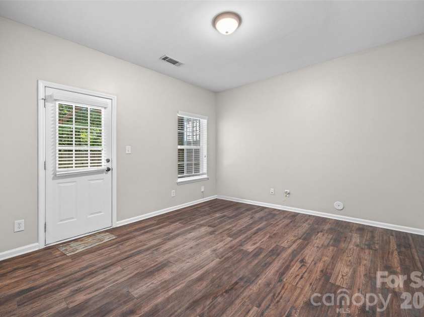 2627 Early Flight Drive, Charlotte, NC 28262.  MLS# CAR4417899, YatesRealty ID 47171. Downstairs bedroom with rear access