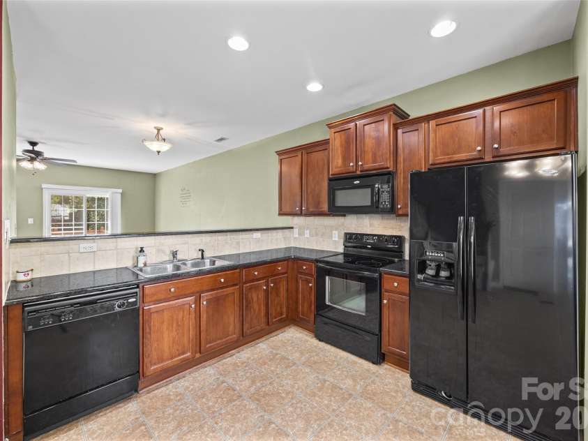 2627 Early Flight Drive, Charlotte, NC 28262.  MLS# CAR4417899, YatesRealty ID 47171. Fridge stays