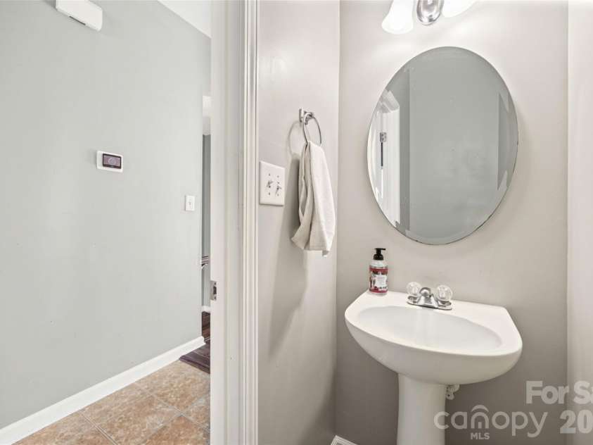 2627 Early Flight Drive, Charlotte, NC 28262.  MLS# CAR4417899, YatesRealty ID 47171. Half bath on main floor