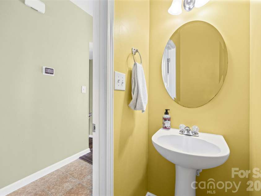 2627 Early Flight Drive, Charlotte, NC 28262.  MLS# CAR4417899, YatesRealty ID 47171. Perfect half bath for guests