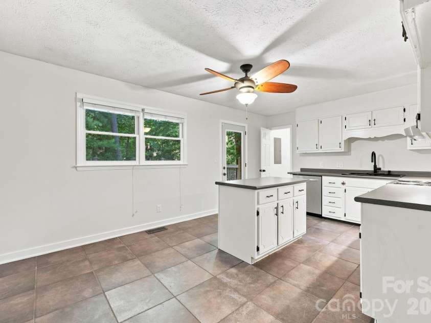 151 Ridgewood Acres Drive, Hendersonville, NC 28792.  MLS# CAR4418419, YatesRealty ID 47183. Dining Area right off Kitchen
