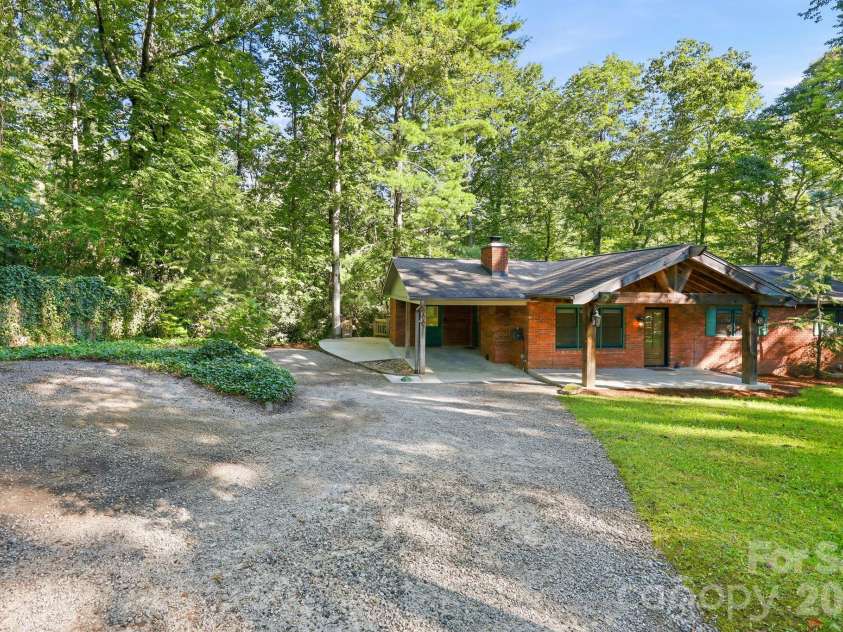 151 Ridgewood Acres Drive, Hendersonville, NC 28792.  MLS# CAR4418419, YatesRealty ID 47183. Driveway with extra parking space