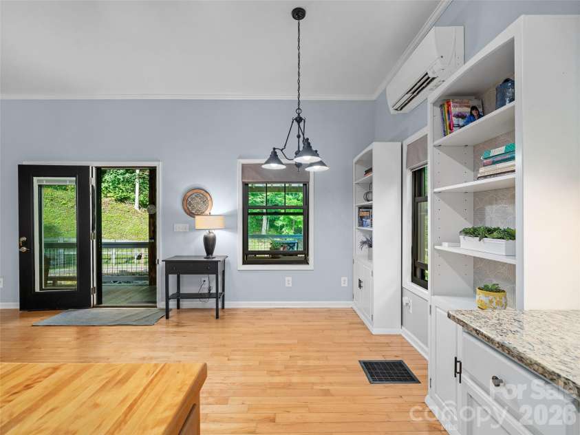 1523 Roaring Fork Road, Burnsville, NC 28714.  MLS# CAR4408382, YatesRealty ID 47187. Kitchen looking into Dining Area