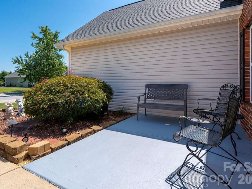 5335 Hackberry Lane, Concord, NC 28027.  MLS# CAR4418402, YatesRealty ID 47188. Front patio