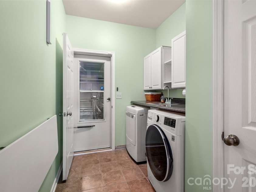 5335 Hackberry Lane, Concord, NC 28027.  MLS# CAR4418402, YatesRealty ID 47188. Laundry room