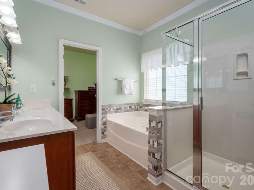 5335 Hackberry Lane, Concord, NC 28027.  MLS# CAR4418402, YatesRealty ID 47188. Primary ensuite bath