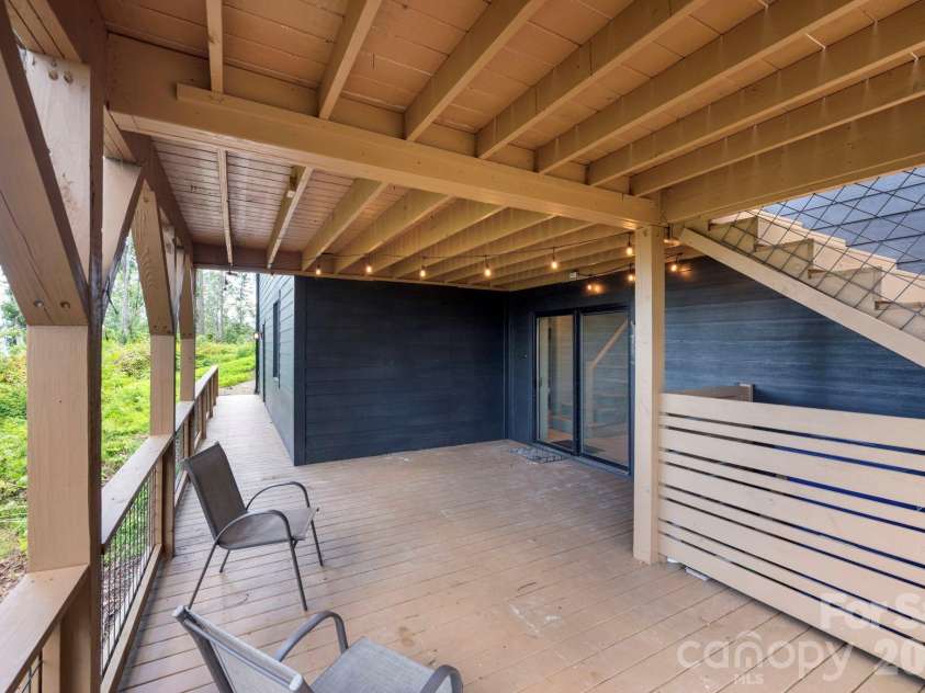 58 Teaberry Lane, Weaverville, NC 28787.  MLS# CAR4407339, YatesRealty ID 47195. Lower deck