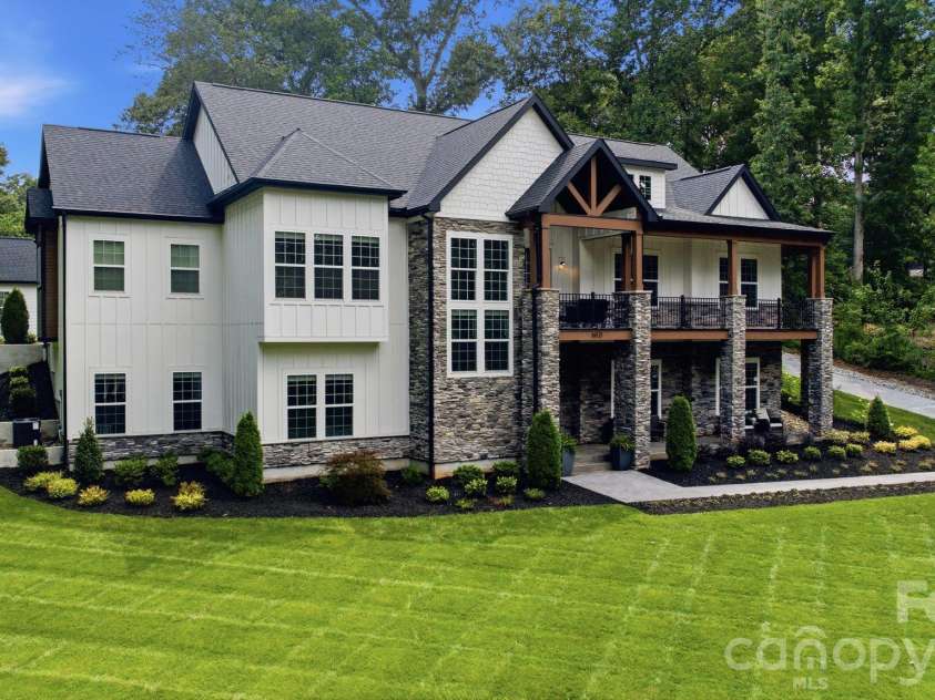 6021 Monticello Drive, Concord, NC 28027.  MLS# CAR4418703, YatesRealty ID 47198. Beautiful front exterior complemented by manicured landscaping