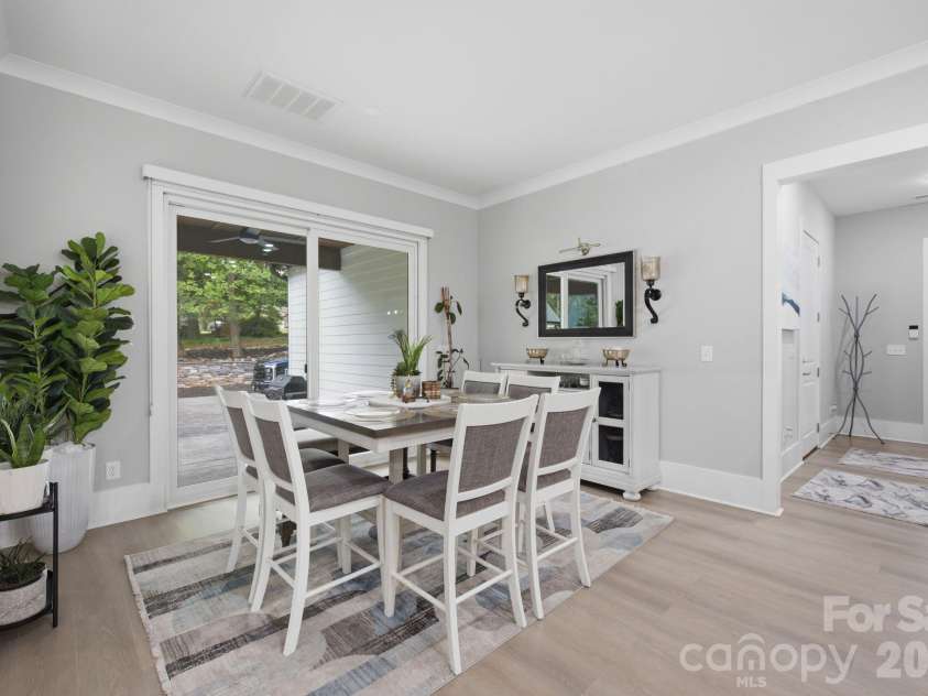 6021 Monticello Drive, Concord, NC 28027.  MLS# CAR4418703, YatesRealty ID 47198. Breakfast area overlooking the backyard