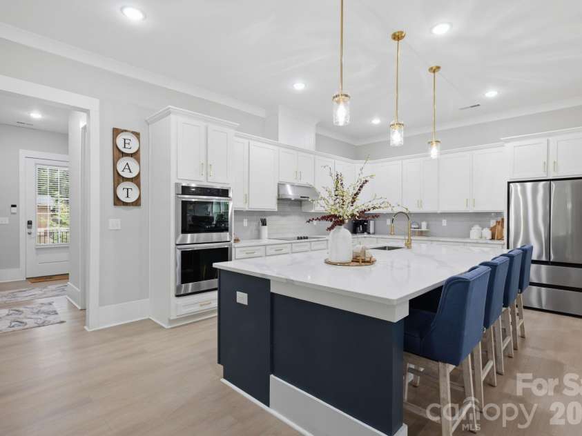 6021 Monticello Drive, Concord, NC 28027.  MLS# CAR4418703, YatesRealty ID 47198. Bright kitchen with abundant cabinetry and generous workspace