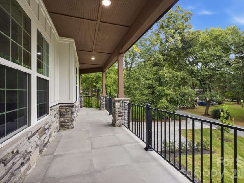 6021 Monticello Drive, Concord, NC 28027.  MLS# CAR4418703, YatesRealty ID 47198. Expansive covered porch.