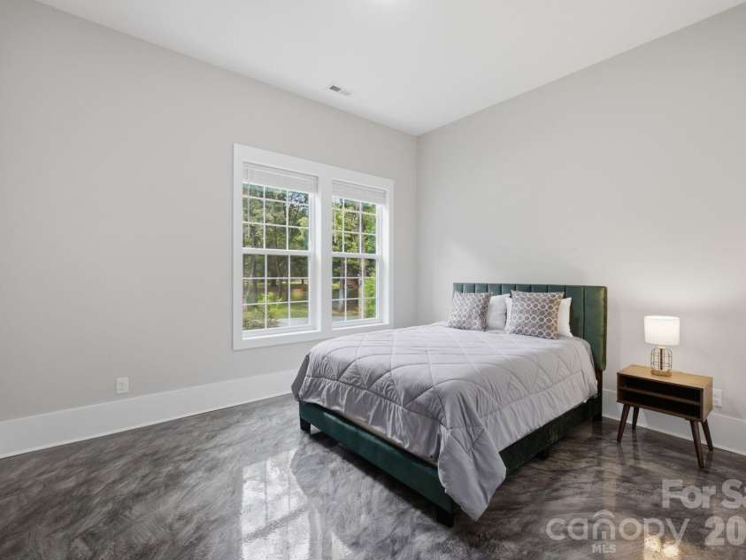 6021 Monticello Drive, Concord, NC 28027.  MLS# CAR4418703, YatesRealty ID 47198. Generously sized lower level bedroom