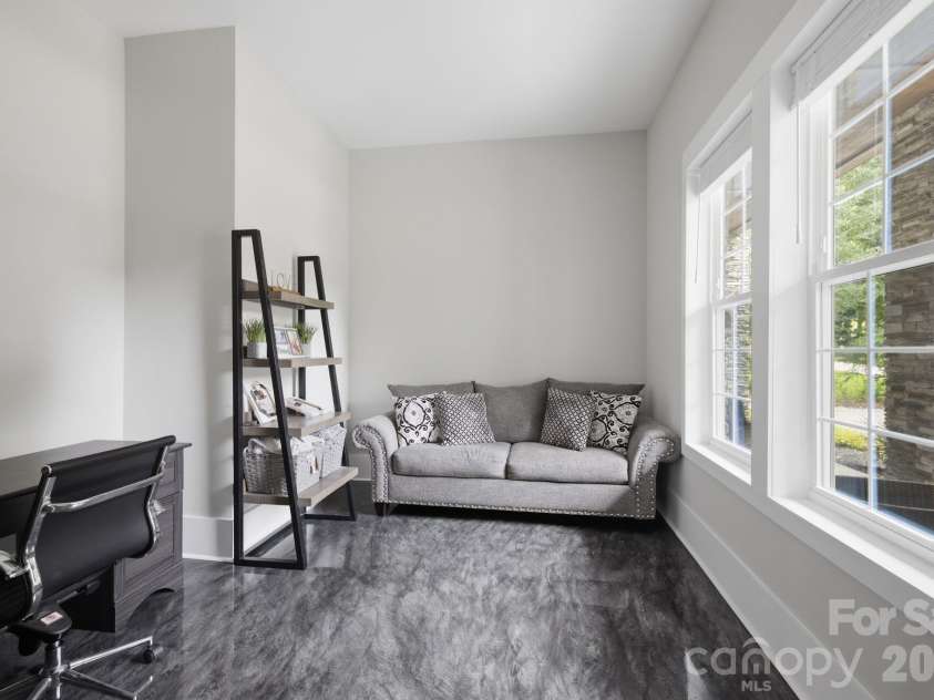 6021 Monticello Drive, Concord, NC 28027.  MLS# CAR4418703, YatesRealty ID 47198. Lower-level flex room ideal for an office or additional sitting area