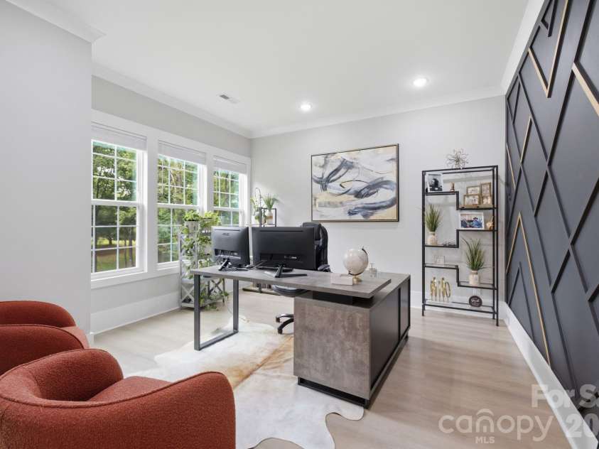 6021 Monticello Drive, Concord, NC 28027.  MLS# CAR4418703, YatesRealty ID 47198. Main level home office with modern accent wall