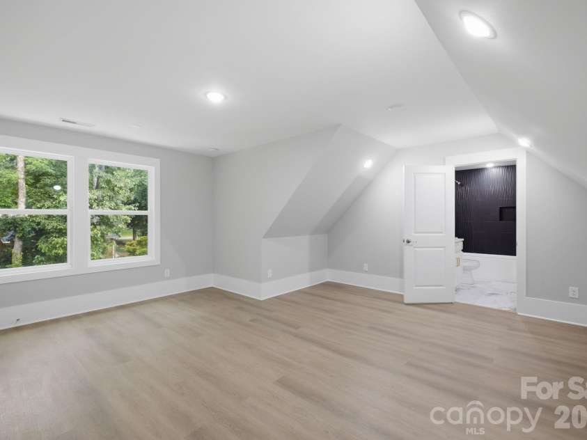 6021 Monticello Drive, Concord, NC 28027.  MLS# CAR4418703, YatesRealty ID 47198. Spacious living area within the second living quarters