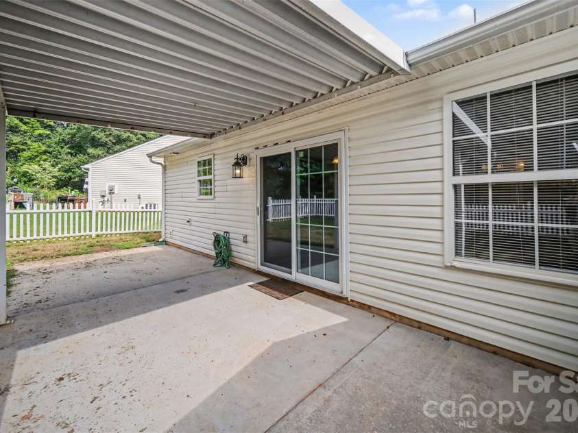 1356 Copper Creek Lane, Fort Mill, SC 29715.  MLS# CAR4418757, YatesRealty ID 47199. Back patio