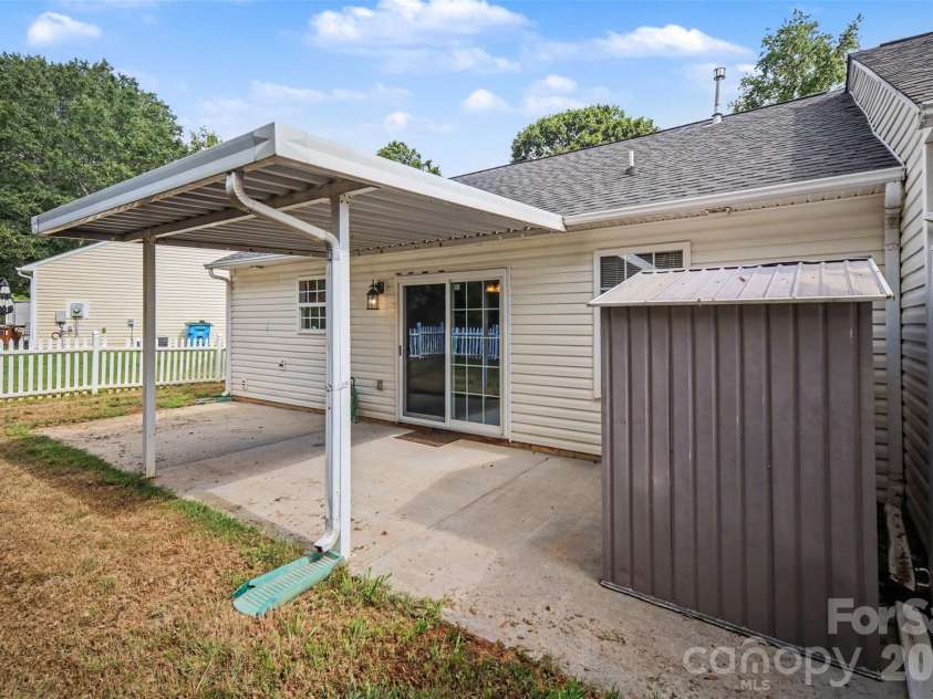 1356 Copper Creek Lane, Fort Mill, SC 29715.  MLS# CAR4418757, YatesRealty ID 47199. Back patio