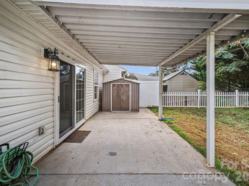 1356 Copper Creek Lane, Fort Mill, SC 29715.  MLS# CAR4418757, YatesRealty ID 47199. Covered back patio