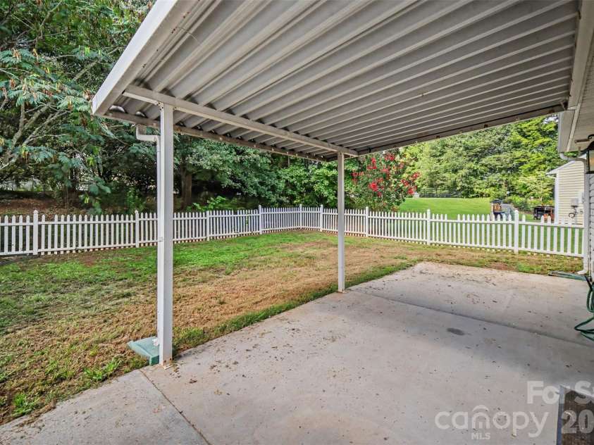 1356 Copper Creek Lane, Fort Mill, SC 29715.  MLS# CAR4418757, YatesRealty ID 47199. Covered back patio