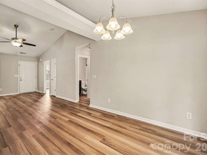 1356 Copper Creek Lane, Fort Mill, SC 29715.  MLS# CAR4418757, YatesRealty ID 47199. Dining and living
