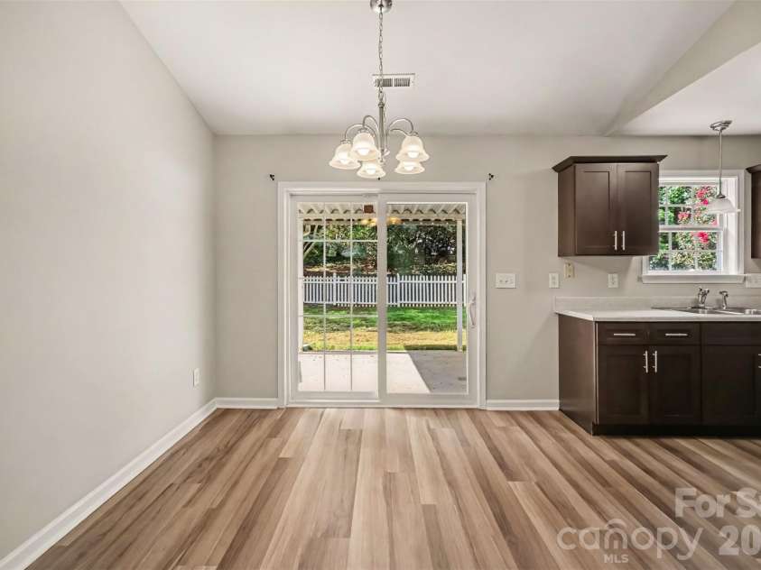 1356 Copper Creek Lane, Fort Mill, SC 29715.  MLS# CAR4418757, YatesRealty ID 47199. Dining into kitchen