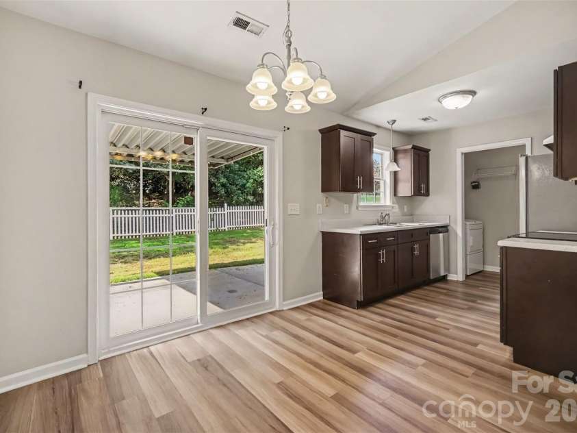 1356 Copper Creek Lane, Fort Mill, SC 29715.  MLS# CAR4418757, YatesRealty ID 47199. Dining into kitchen