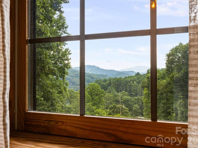 515 Raccoon Branch Road, Green Mountain, NC 28740.  MLS# CAR4413585, YatesRealty ID 47225. 