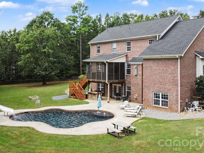 3647 Venetian Way, York, SC 29745.  MLS# CAR4417986, YatesRealty ID 47230. Rear elevation, pool & yard