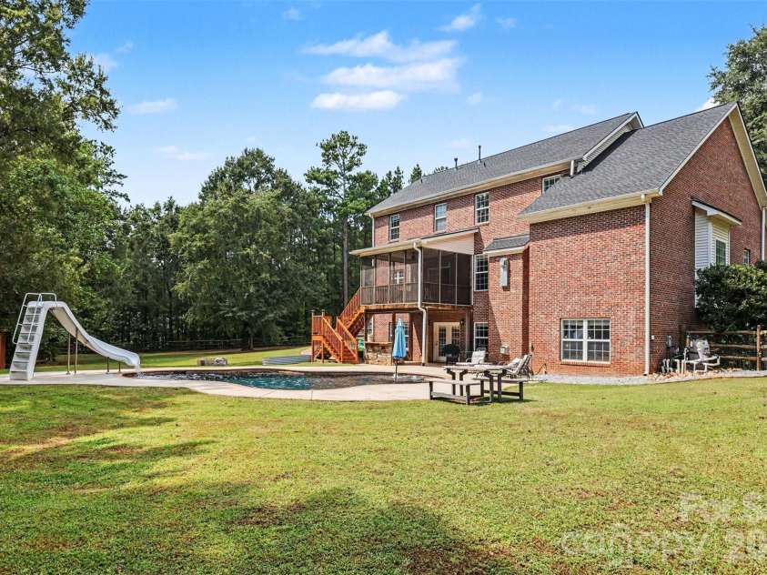 3647 Venetian Way, York, SC 29745.  MLS# CAR4417986, YatesRealty ID 47230. Wider backyard/pool perspective