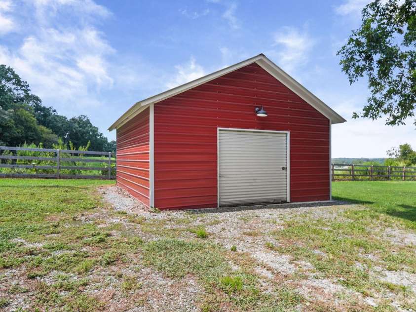 2915 Mills Harris Road, Marshville, NC 28103.  MLS# CAR4412420, YatesRealty ID 47236. Detached Garage- Gym
