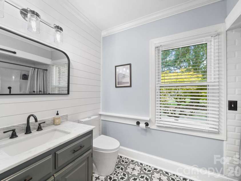 2915 Mills Harris Road, Marshville, NC 28103.  MLS# CAR4412420, YatesRealty ID 47236. Downstairs 2nd Full Bath