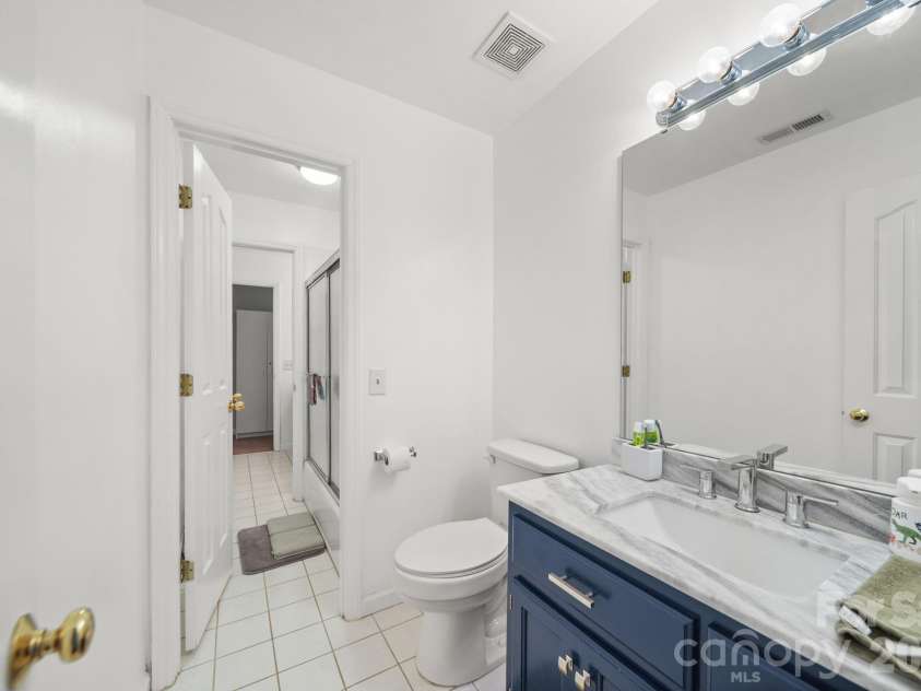 2915 Mills Harris Road, Marshville, NC 28103.  MLS# CAR4412420, YatesRealty ID 47236. Upper Bathroom