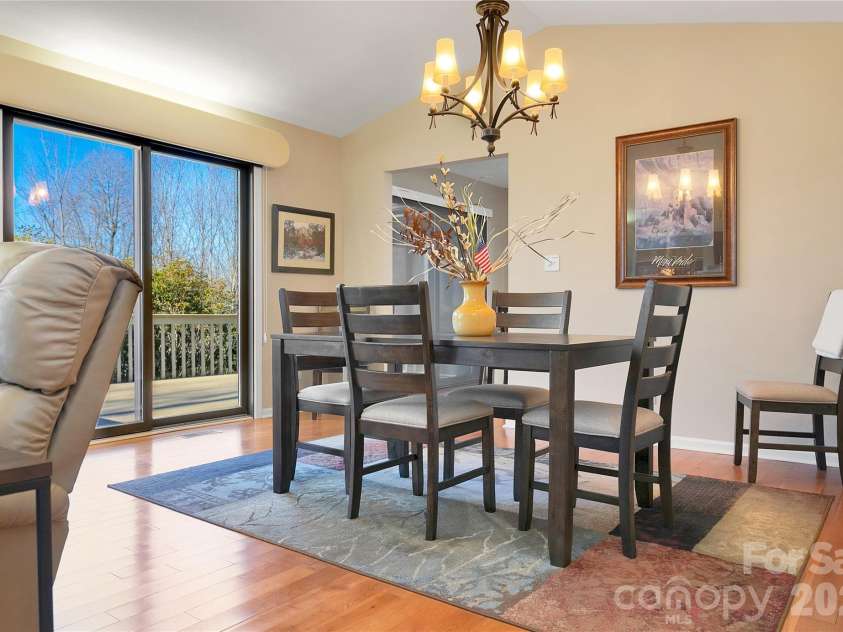 59 Agaliha Lane, Brevard, NC 28712.  MLS# CAR4338161, YatesRealty ID 4724. Dining area has access out to the Deck for additional entertainment space.