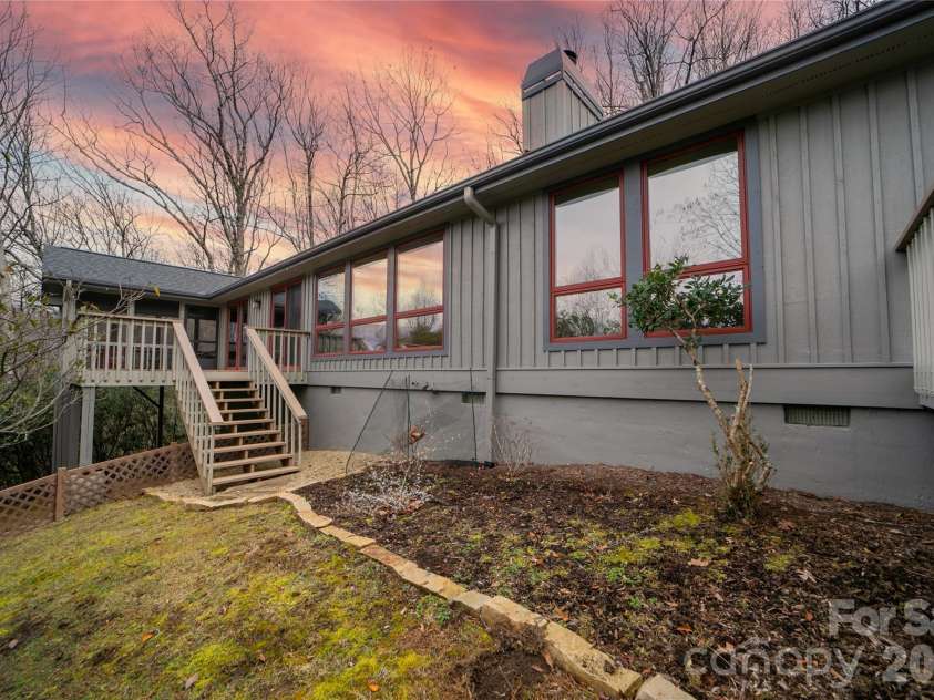 59 Agaliha Lane, Brevard, NC 28712.  MLS# CAR4338161, YatesRealty ID 4724. Easy access from the deck into the backyard.