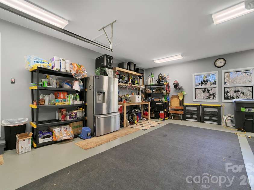 59 Agaliha Lane, Brevard, NC 28712.  MLS# CAR4338161, YatesRealty ID 4724. Garage Refrigerator has been recently replaced. 