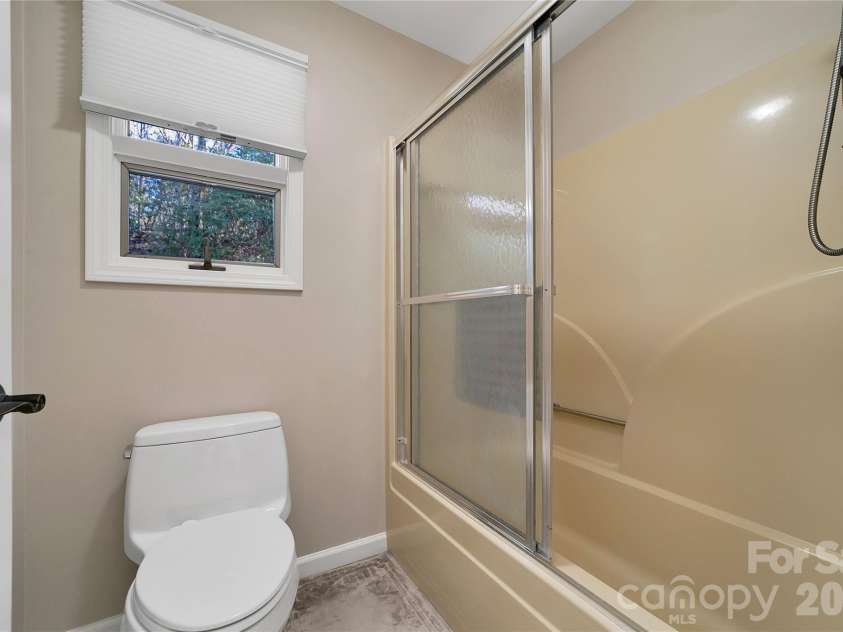 59 Agaliha Lane, Brevard, NC 28712.  MLS# CAR4338161, YatesRealty ID 4724. Shower/Bathtub area in Guest Bathroom