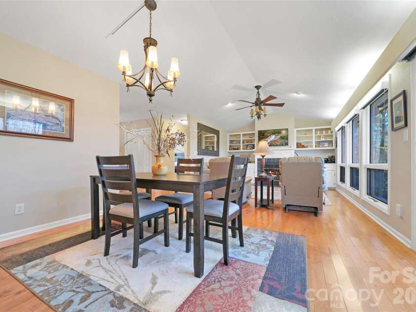 59 Agaliha Lane, Brevard, NC 28712.  MLS# CAR4338161, YatesRealty ID 4724. Site lines to the Great Room from the Dining Area