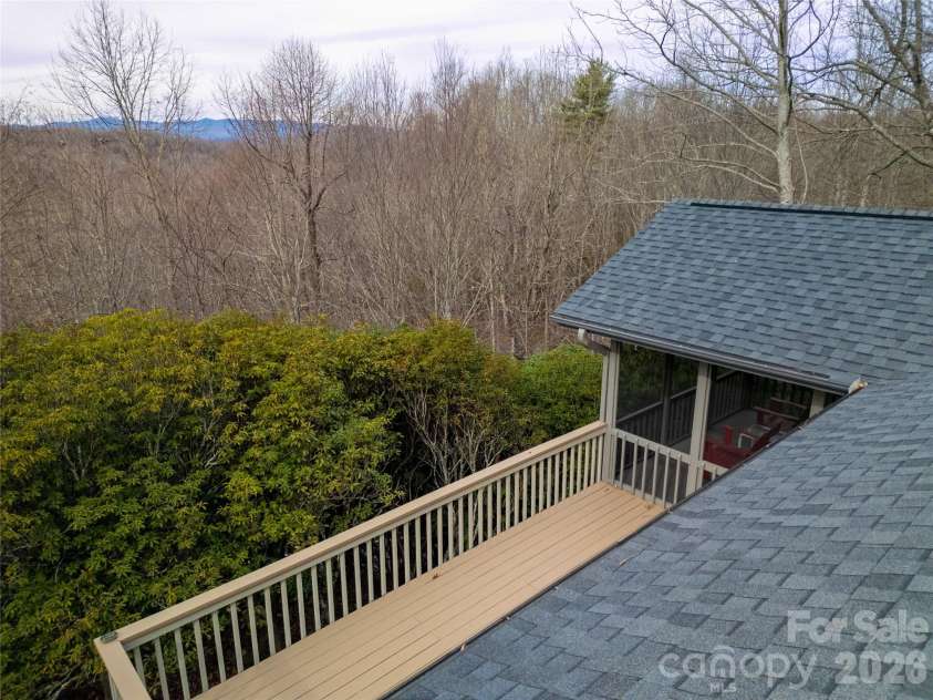 59 Agaliha Lane, Brevard, NC 28712.  MLS# CAR4338161, YatesRealty ID 4724. Winter Mountain Views from the deck and screened porch