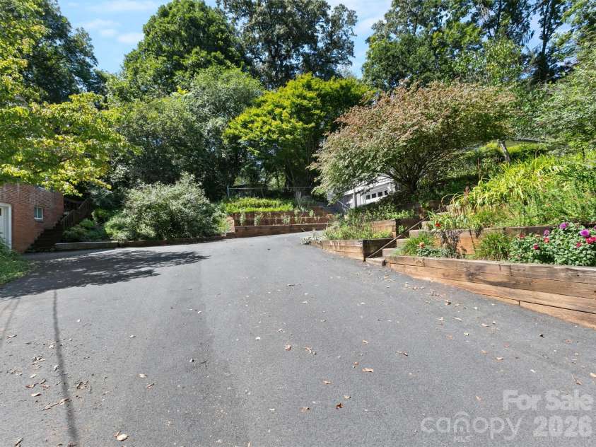 28 Arthur Road, Asheville, NC 28806.  MLS# CAR4418167, YatesRealty ID 47243. Driving Home and Up the Shared Driveway
