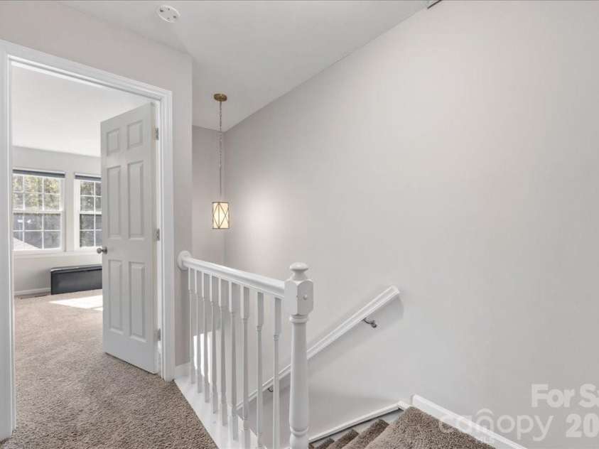 1301 Maple Shade Lane, Charlotte, NC 28270.  MLS# CAR4358514, YatesRealty ID 4725. 2nd floor hallway