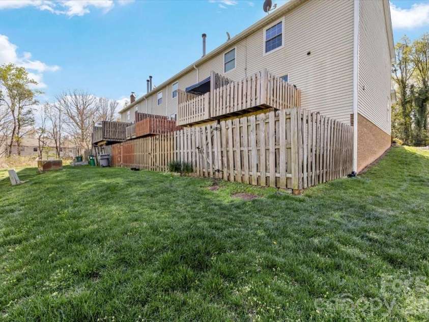 1301 Maple Shade Lane, Charlotte, NC 28270.  MLS# CAR4358514, YatesRealty ID 4725. Greenspace behind patio