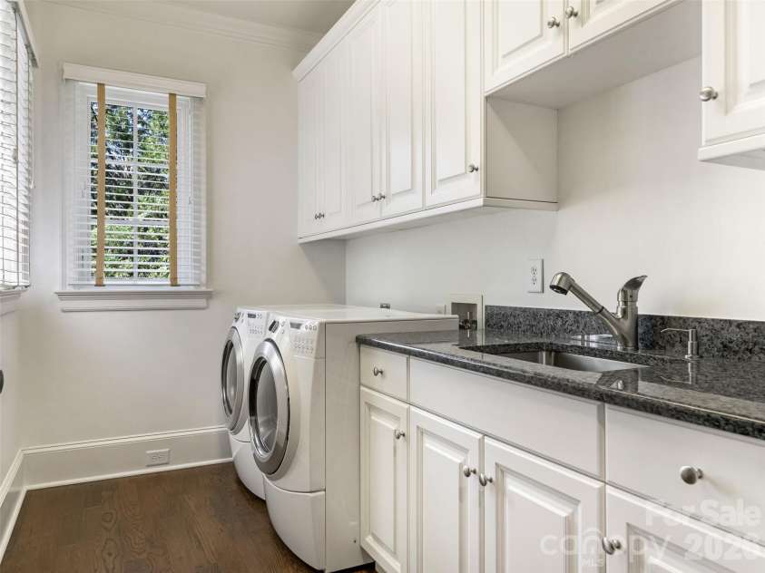 2946 Wheelock Road, Charlotte, NC 28211.  MLS# CAR4422920, YatesRealty ID 47250. Upstairs Laundry Room