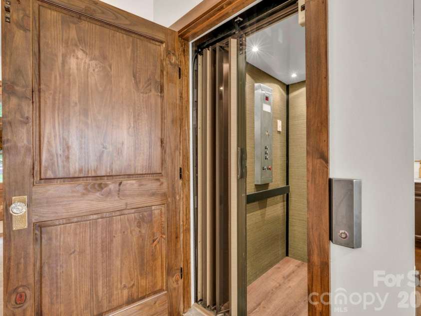 368 Green Hill Woods, Blowing Rock, NC 28605.  MLS# CAR4411772, YatesRealty ID 47263. Elevator to all three floors!